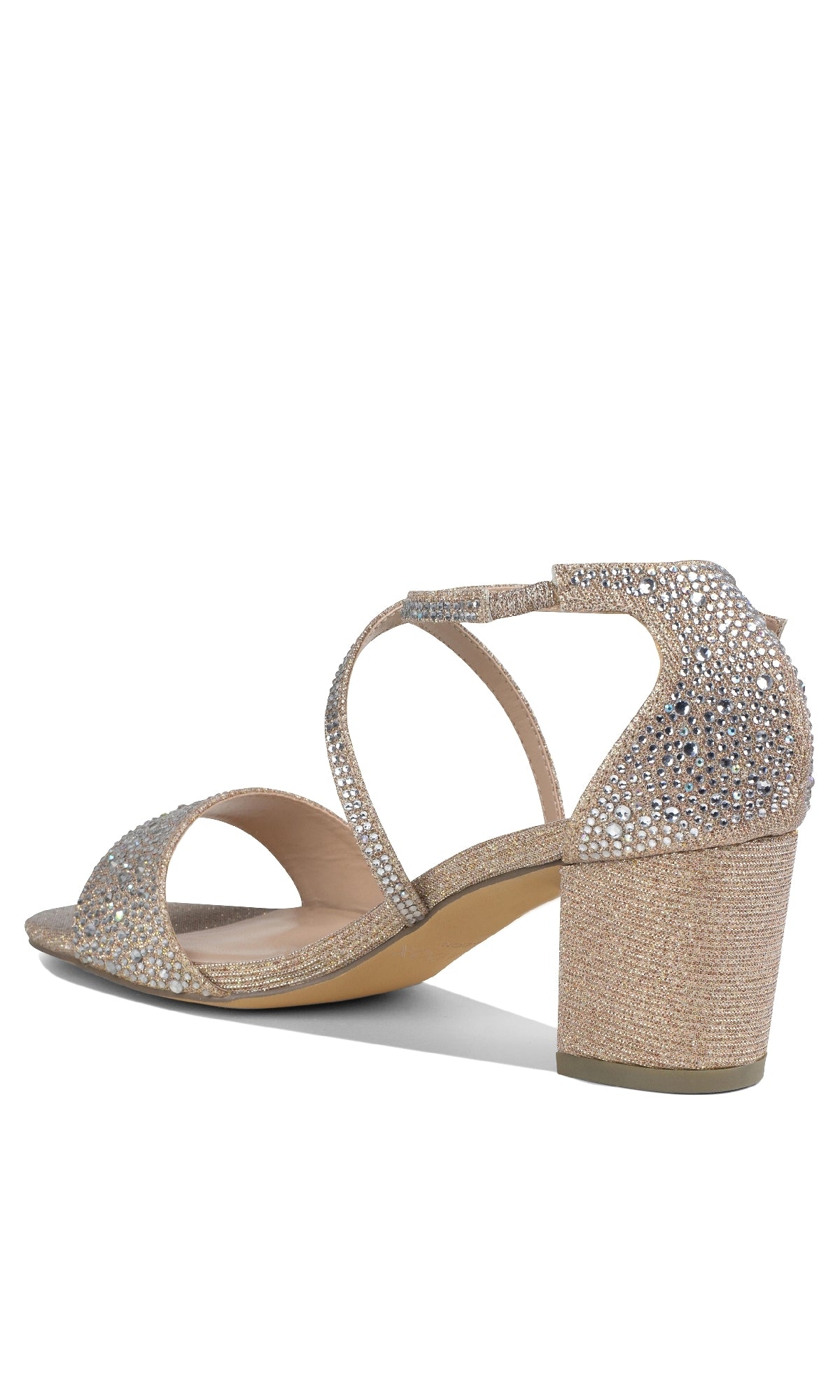 The Ines Champagne Prom Shoe by Paradox London (P2212) is a women’s sandal with 2-inch block heels, open toe, ankle strap, and glittery rhinestone details, shown from a rear side angle.